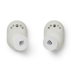devialet-gemini-ii-light-pearl-product-image-7 Pair of white wireless earbuds with silicone ear tips