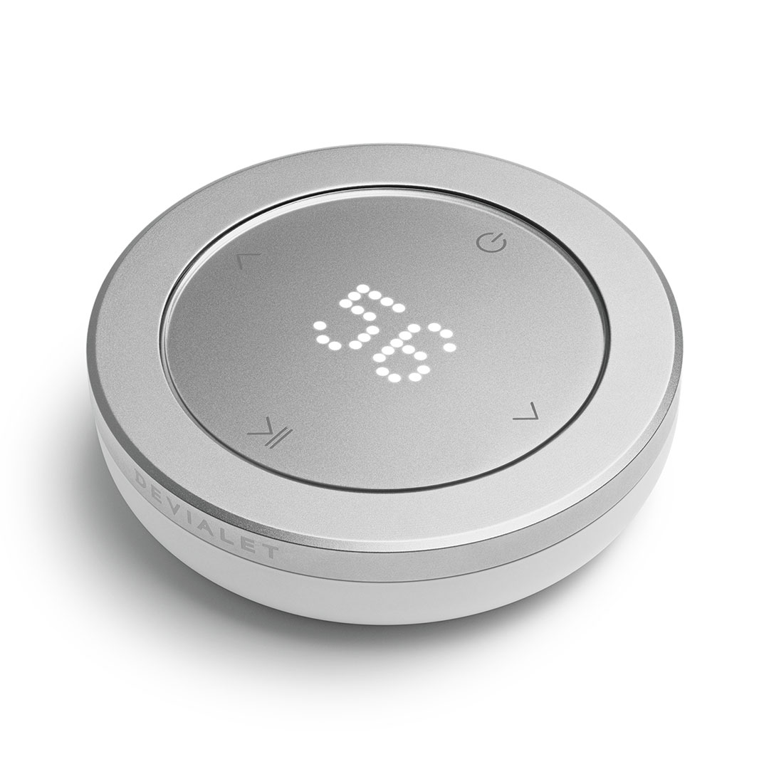 devialet-phantom-remote-light-pearl-product-image-1 Silver Devalet smart device displaying 36 on LED screen