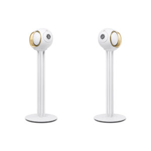 Pair of white and
  gold Devialet Phantom speakers on pedestal stands