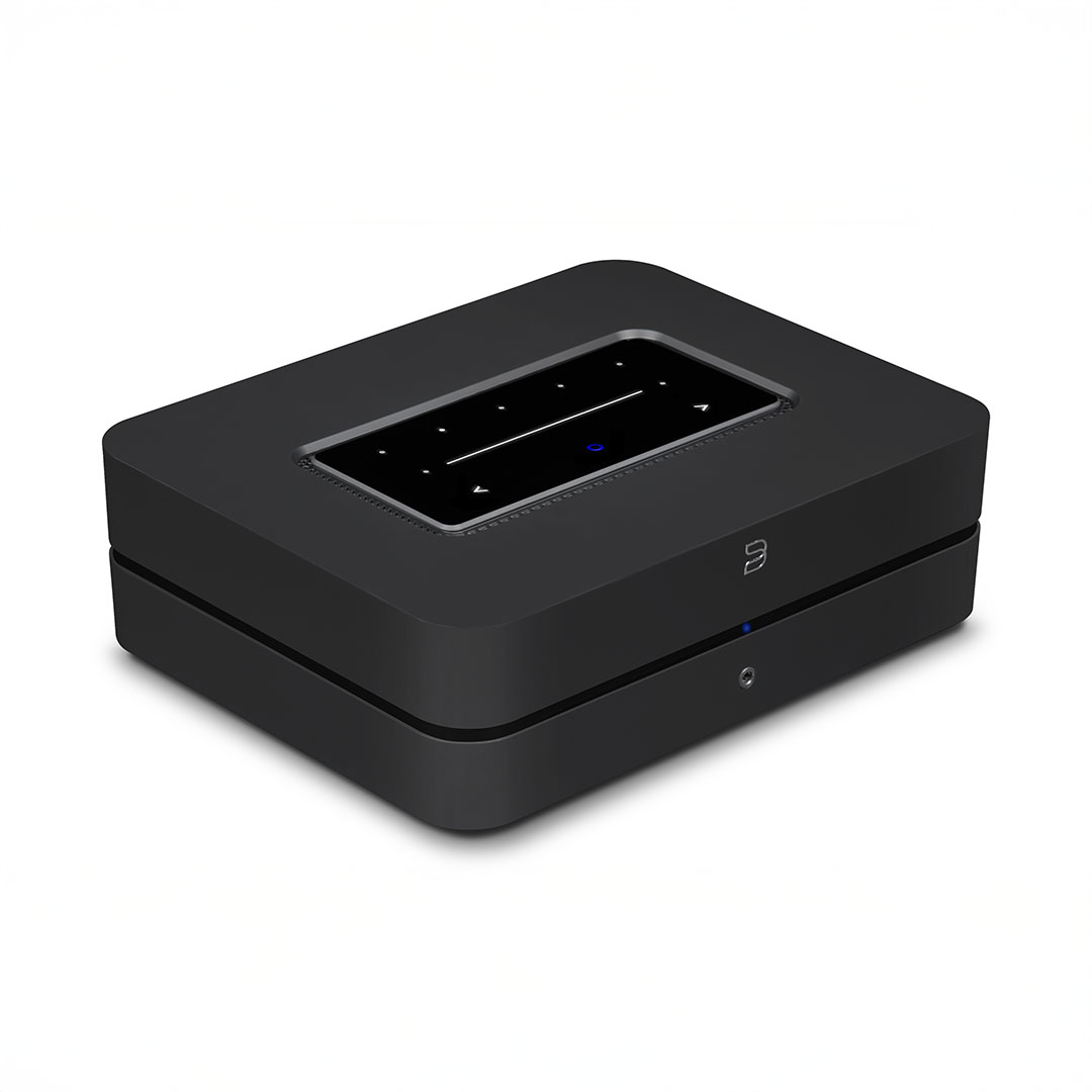Black digital media streaming device on white background.