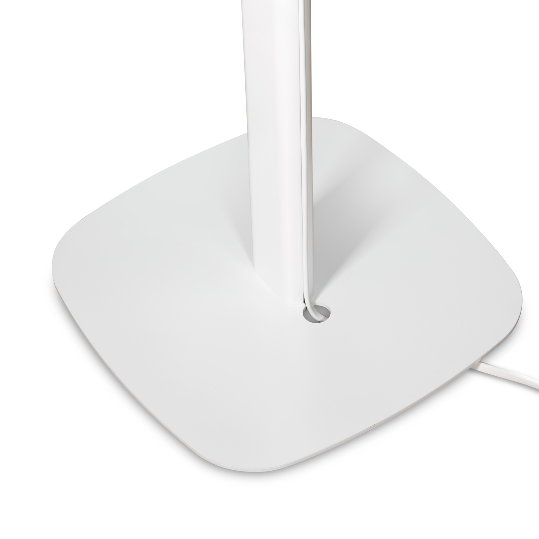 White lamp base with cord management feature.