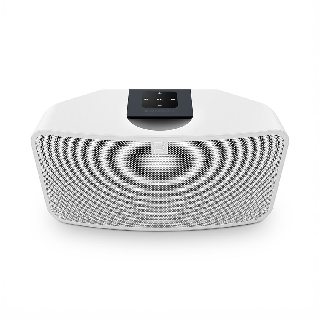 White wireless speaker with control panel on top.