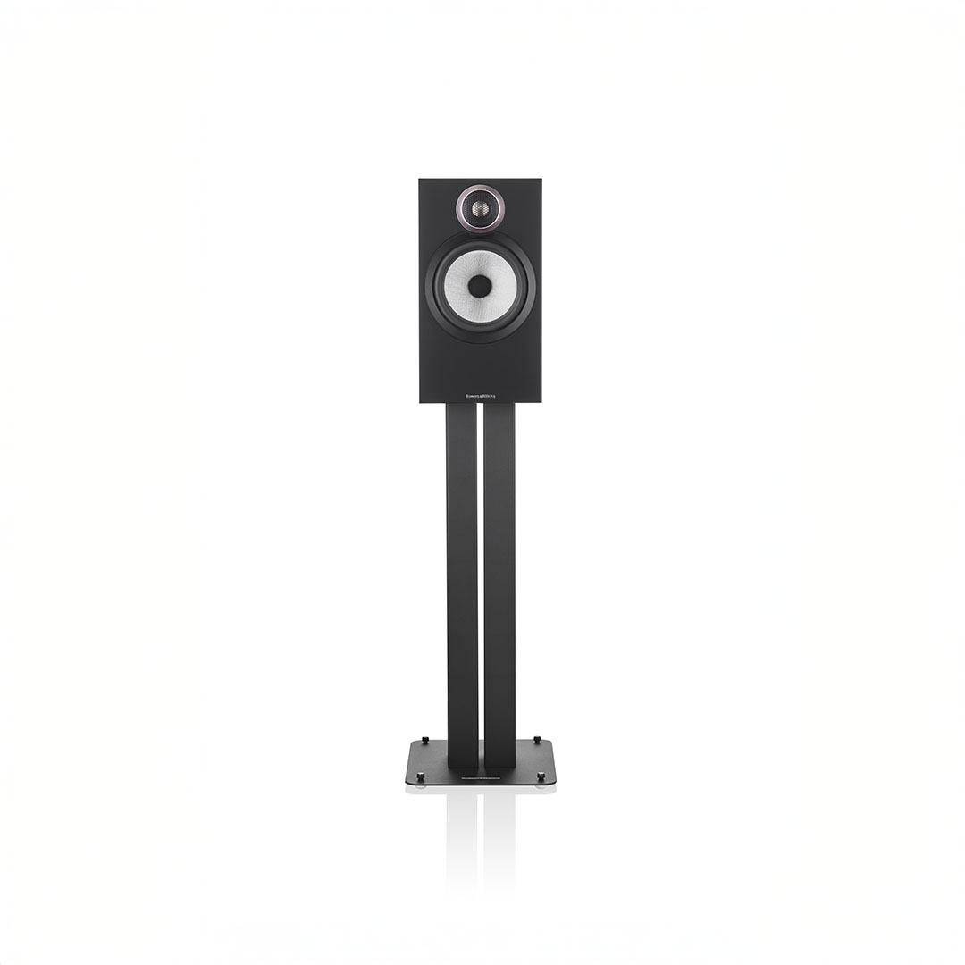 Black speaker on stand, minimalist design