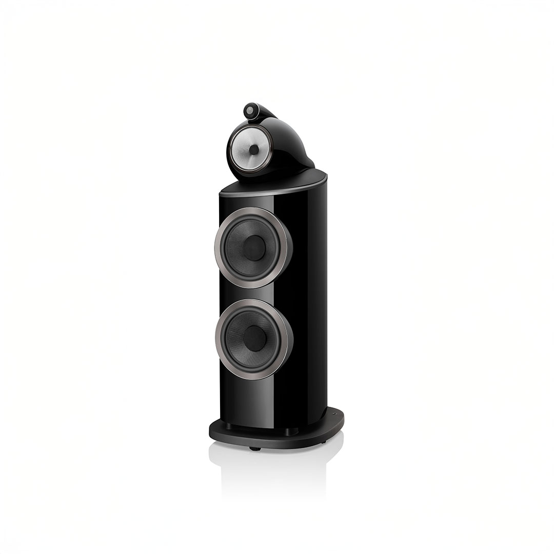 High-end black tower speaker on white background.