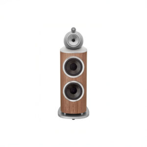 Wooden tower speaker with three circular components.