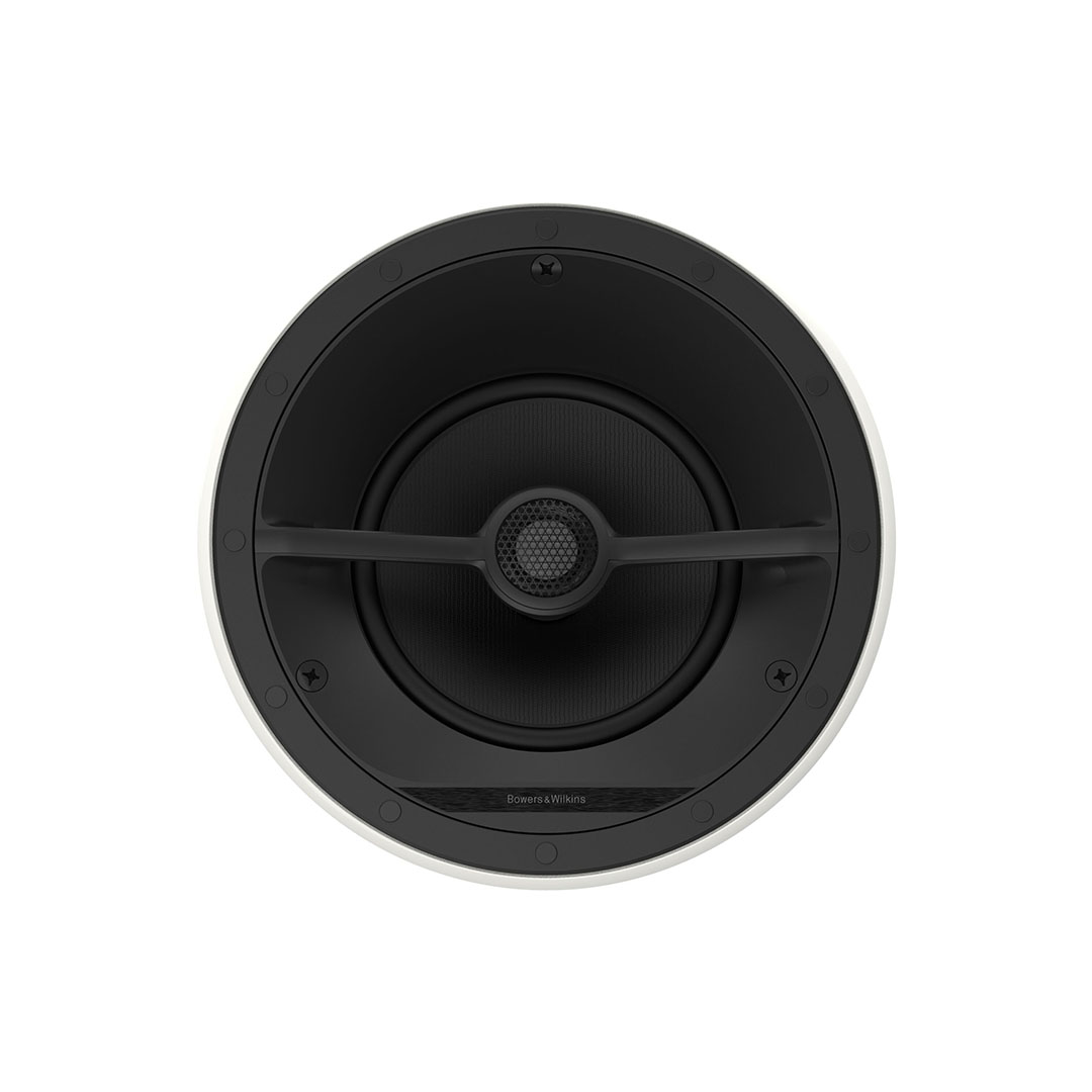 Ceiling-mounted black round speaker, close-up view.