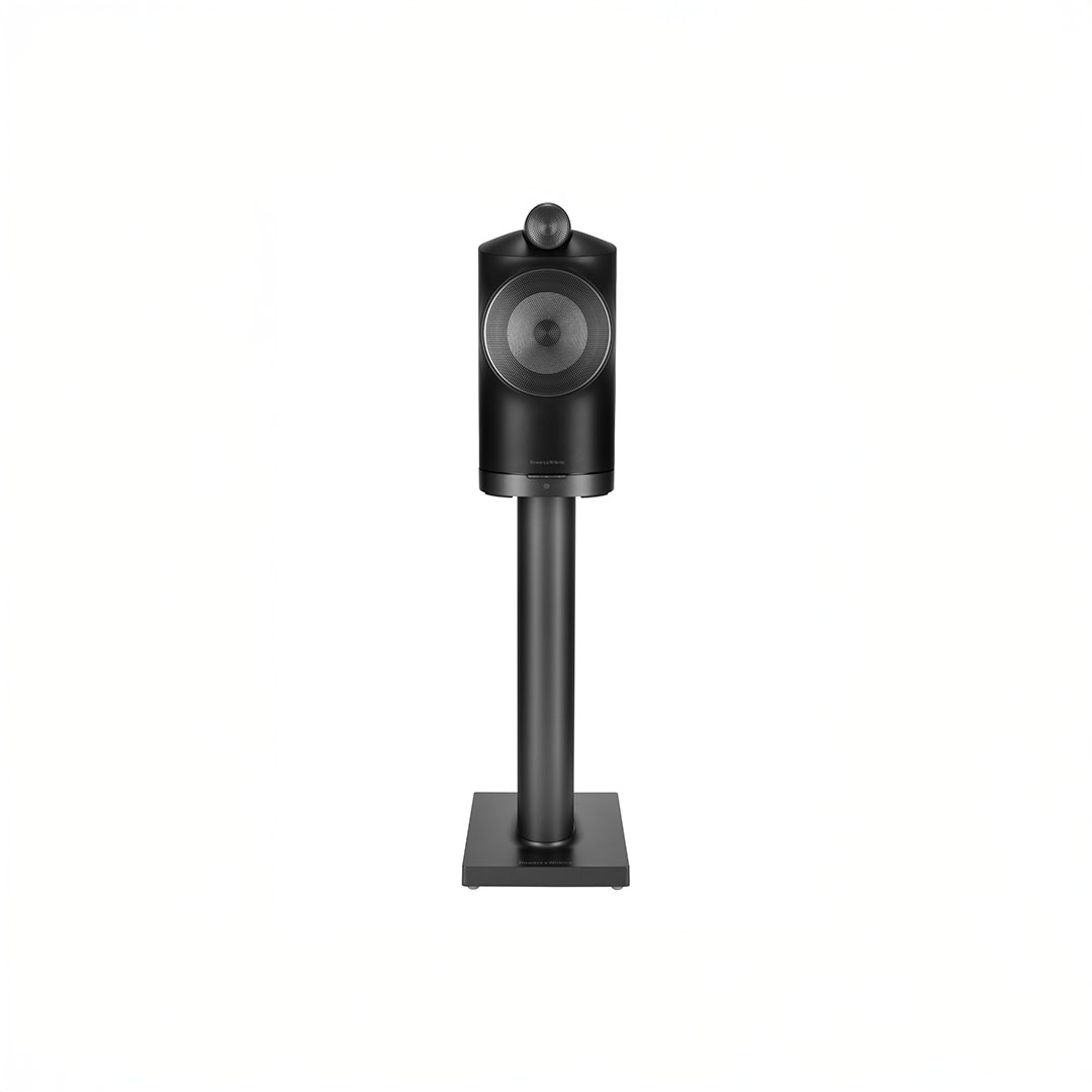 Black speaker on stand, minimalist design.