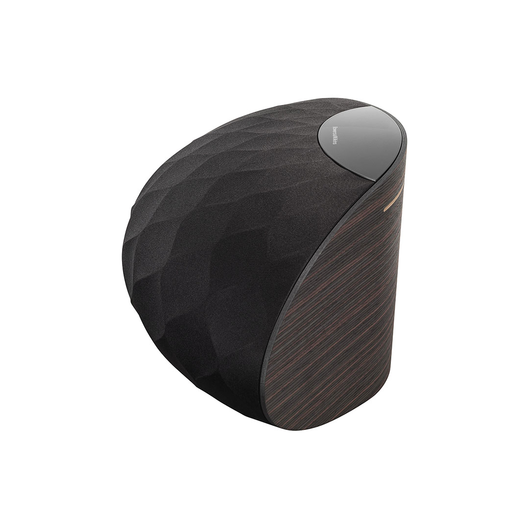 Modern black wireless speaker with textured design.