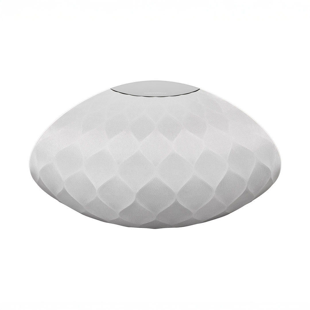 Modern white speaker with geometric design.
