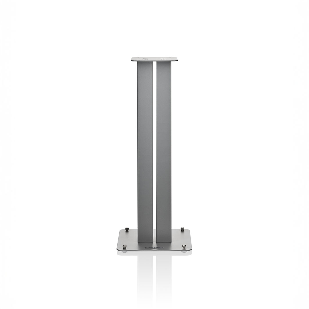 Silver metal speaker stand on white background.