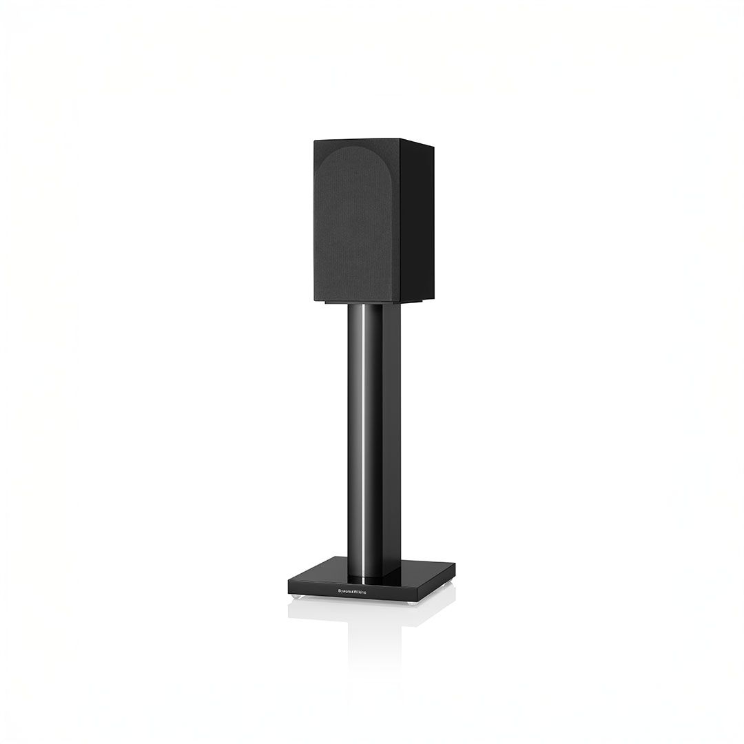 Black speaker on a tall stand