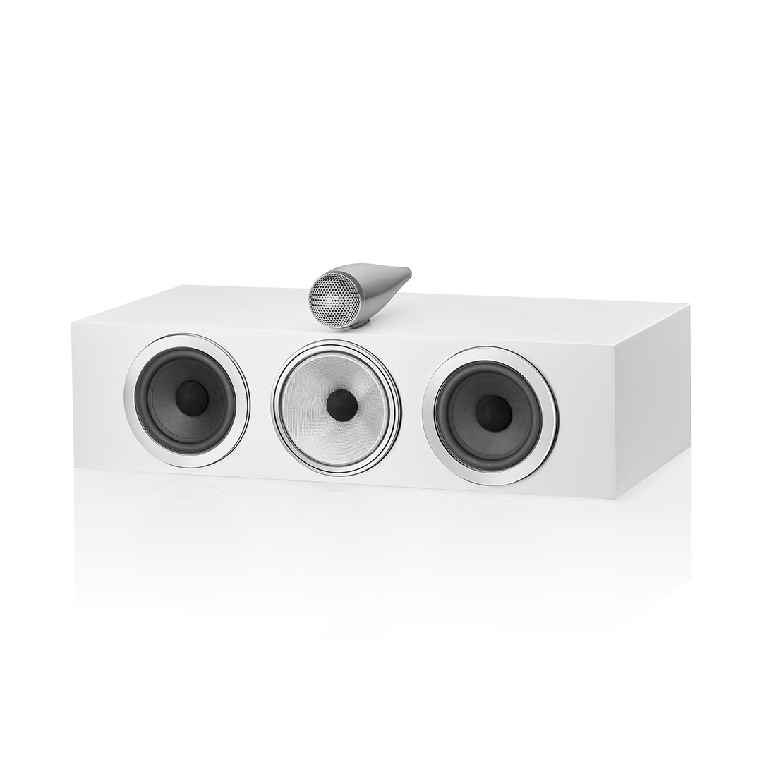 White speaker with three round drivers and tweeter.
