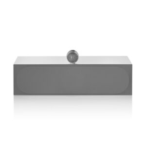 Modern silver speaker with top tweeter on reflection.