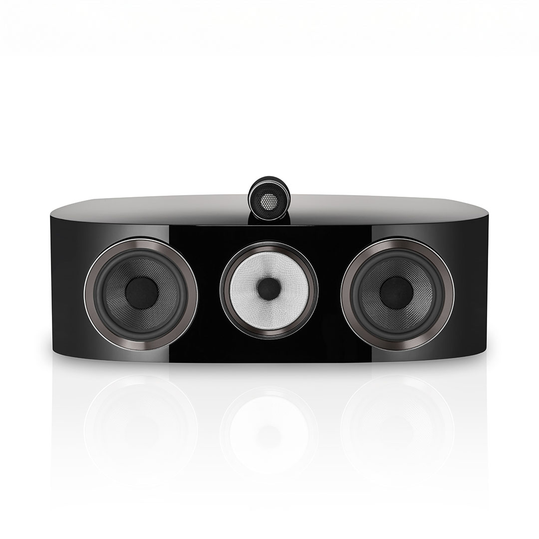 Black center speaker with three circular drivers.