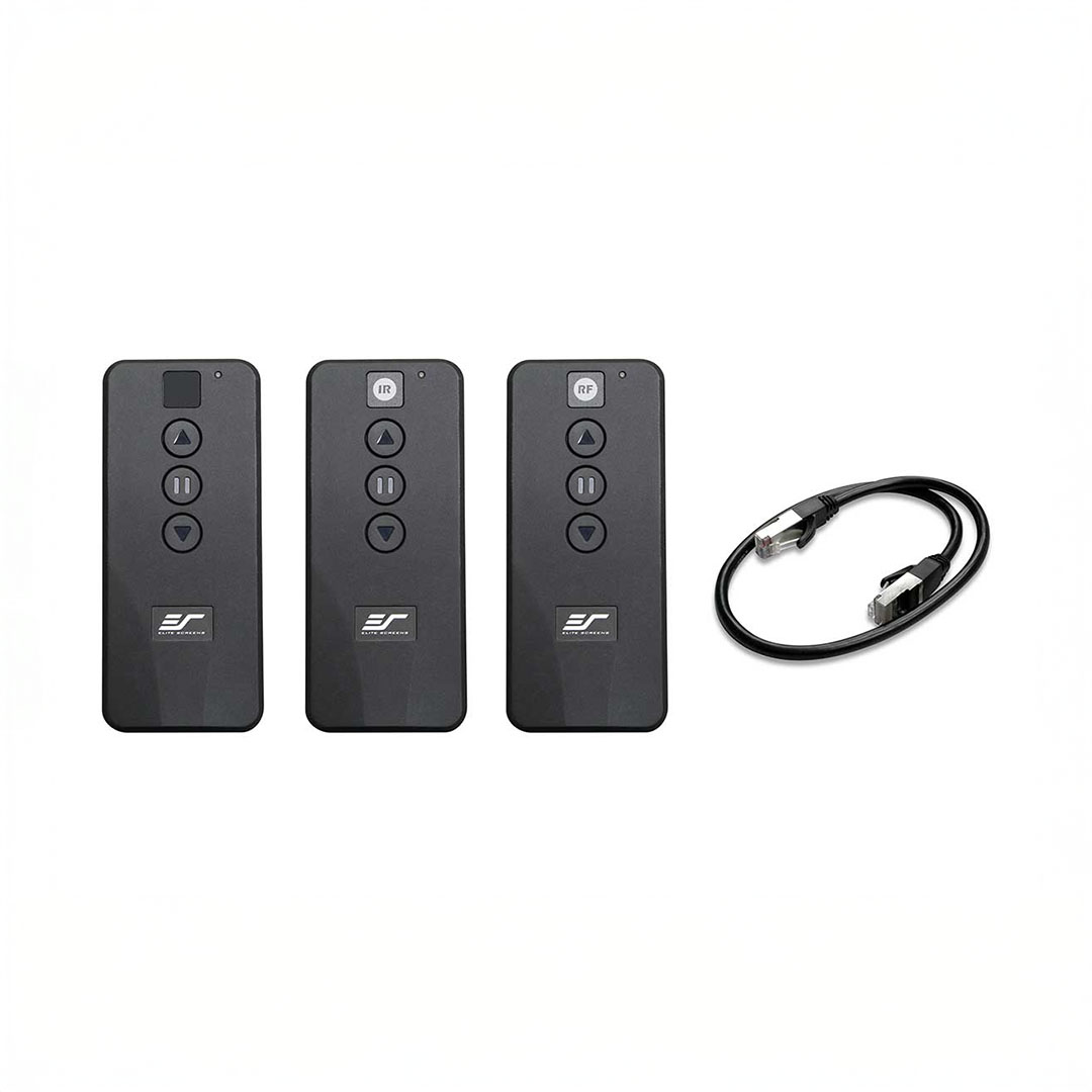 Three remote controls and cable on white background.