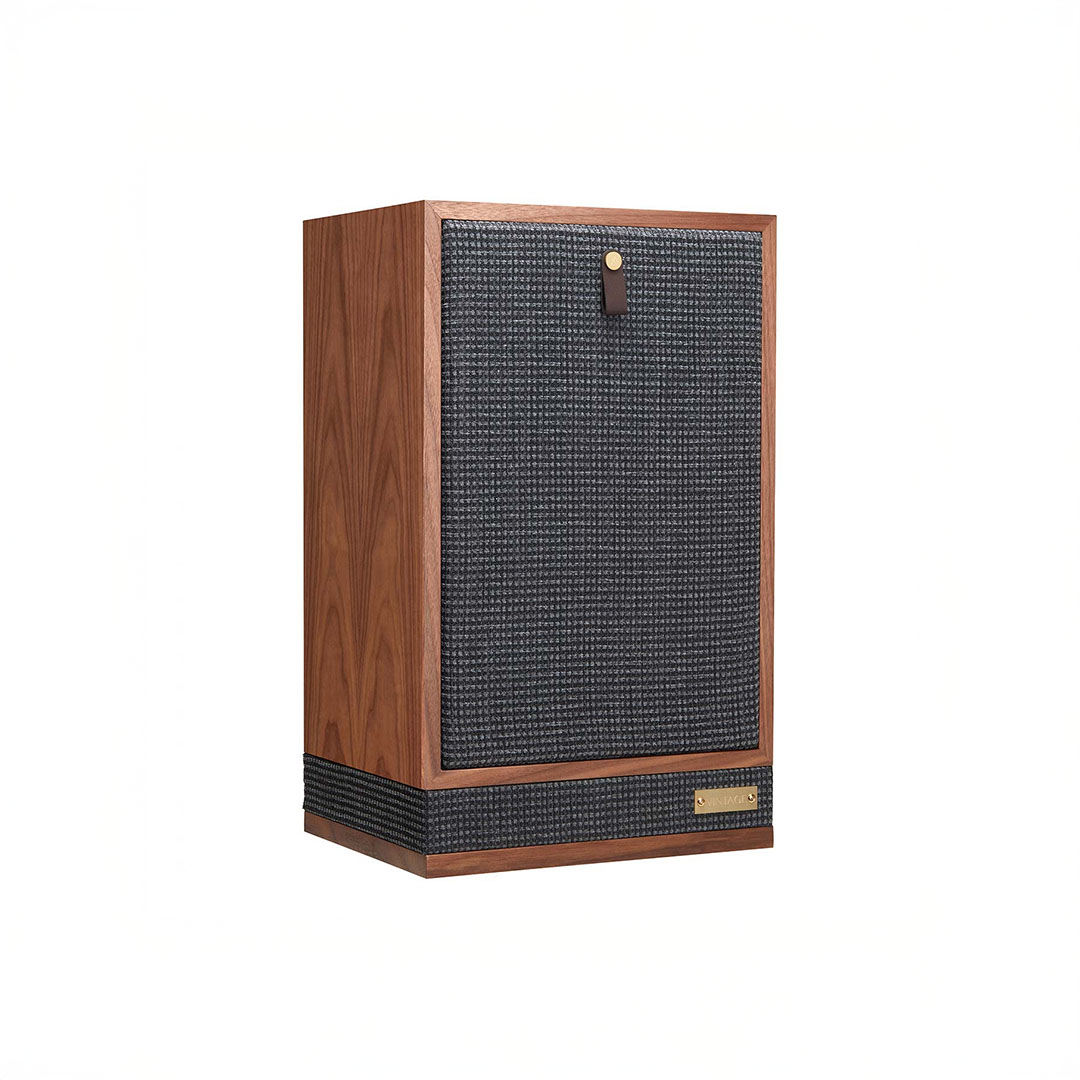 Retro-style wooden speaker with black grille.