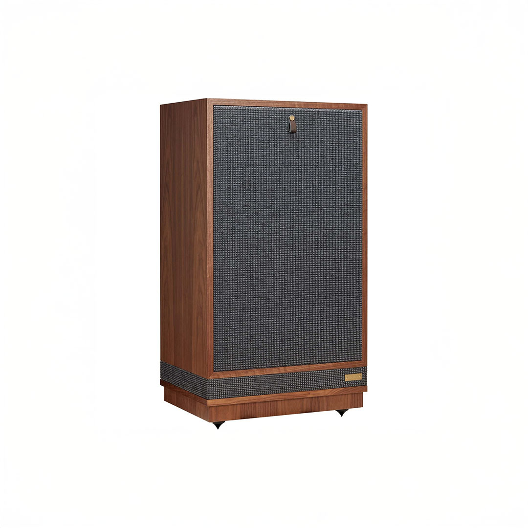 Wooden speaker with gray fabric front grille.