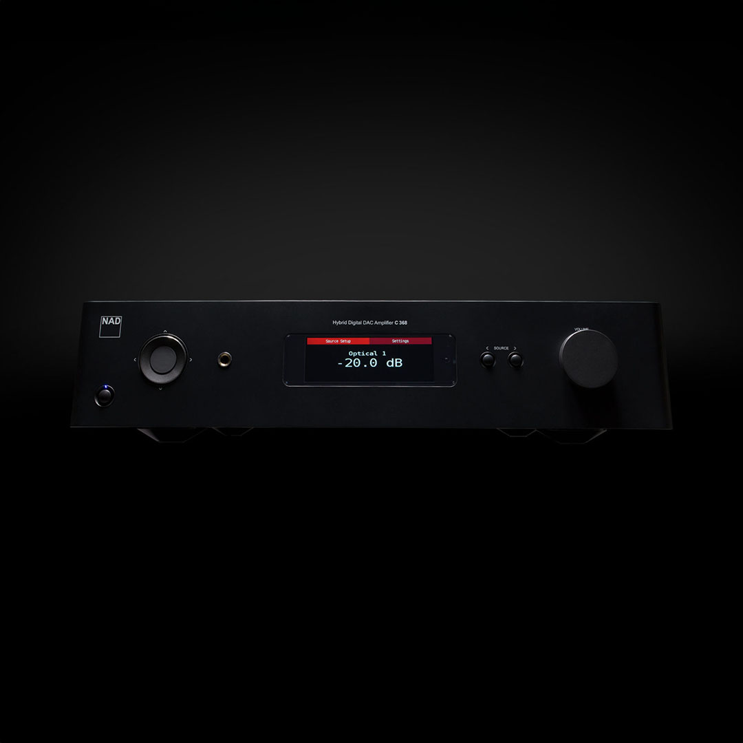 Black digital amplifier with display, buttons, and dial.