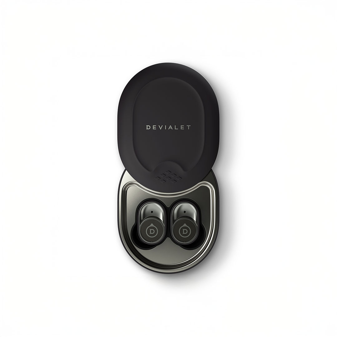 Devialet wireless earbuds in charging case.