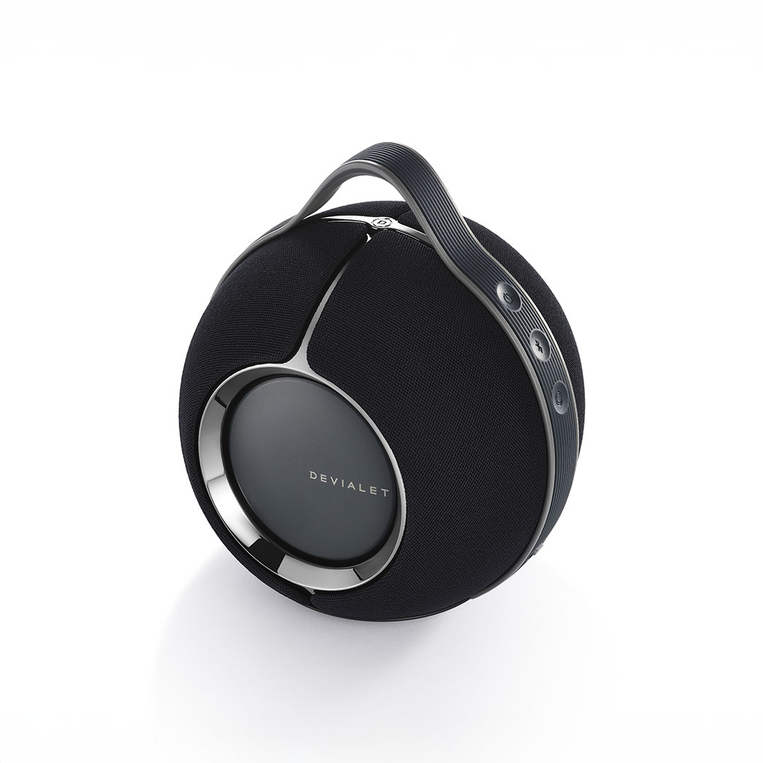 Spherical black speaker with handle and buttons