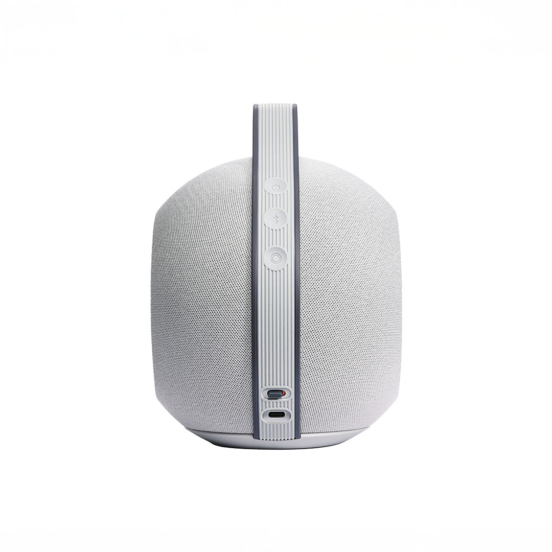 White wireless speaker with control buttons.