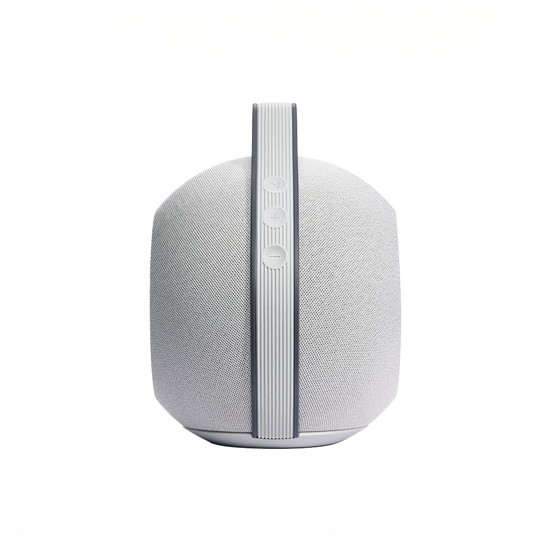 White wireless speaker with control buttons.