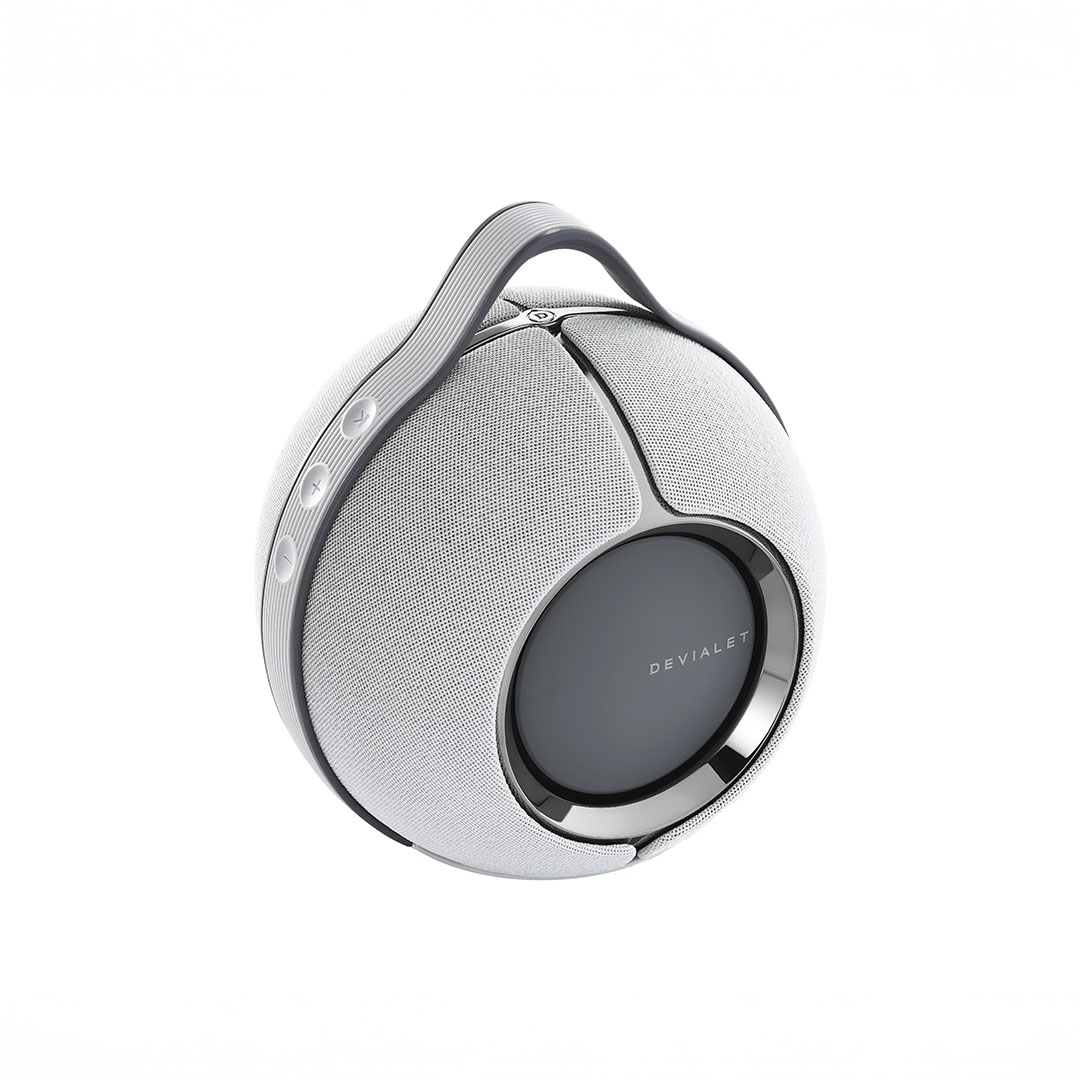 Portable round speaker with handle and buttons