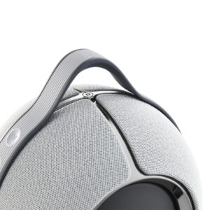 Close-up of spherical gray speaker with handle
