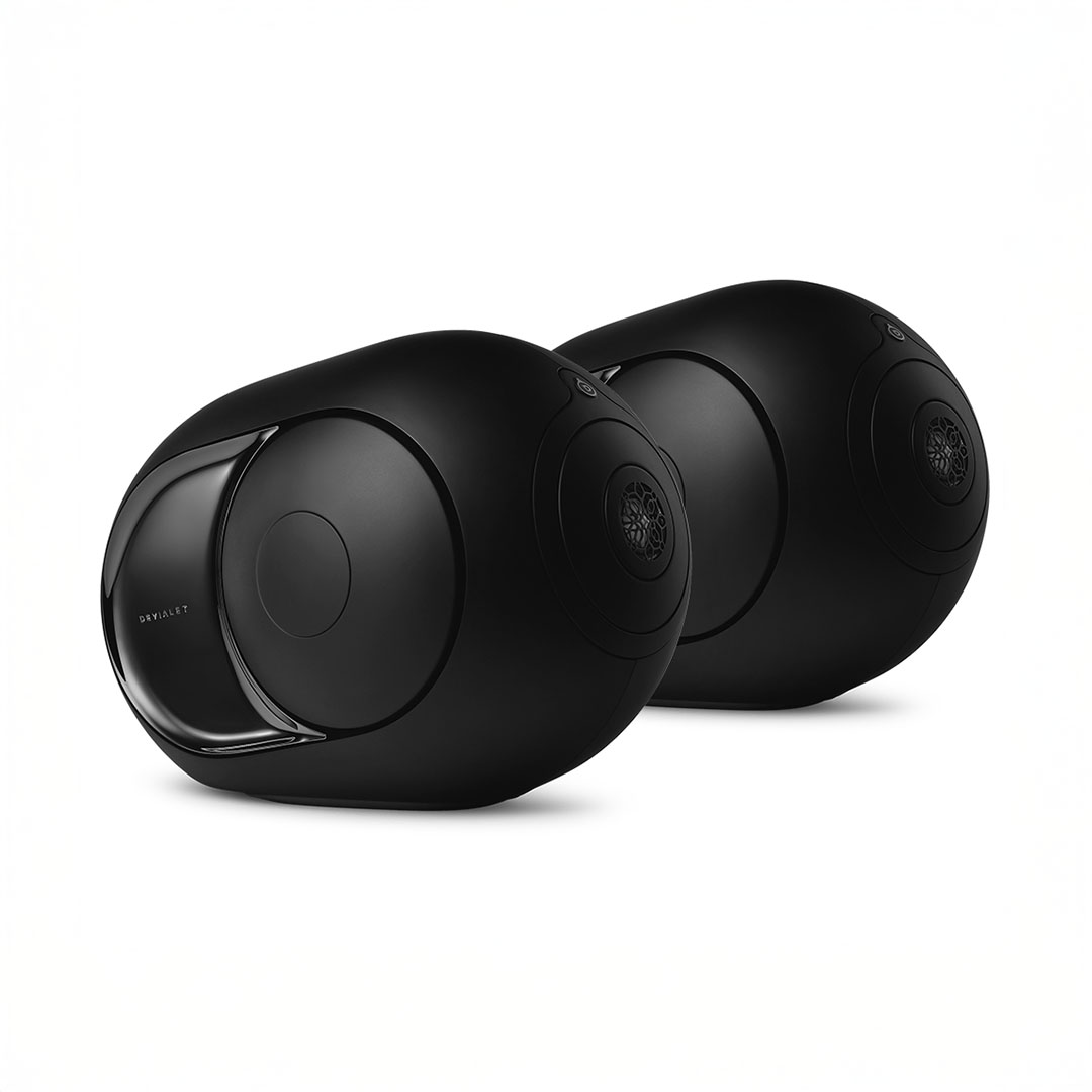 Dual black speakers on white background