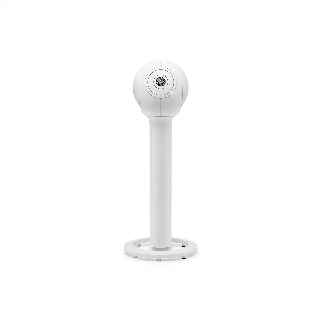 White speaker on a tall stand