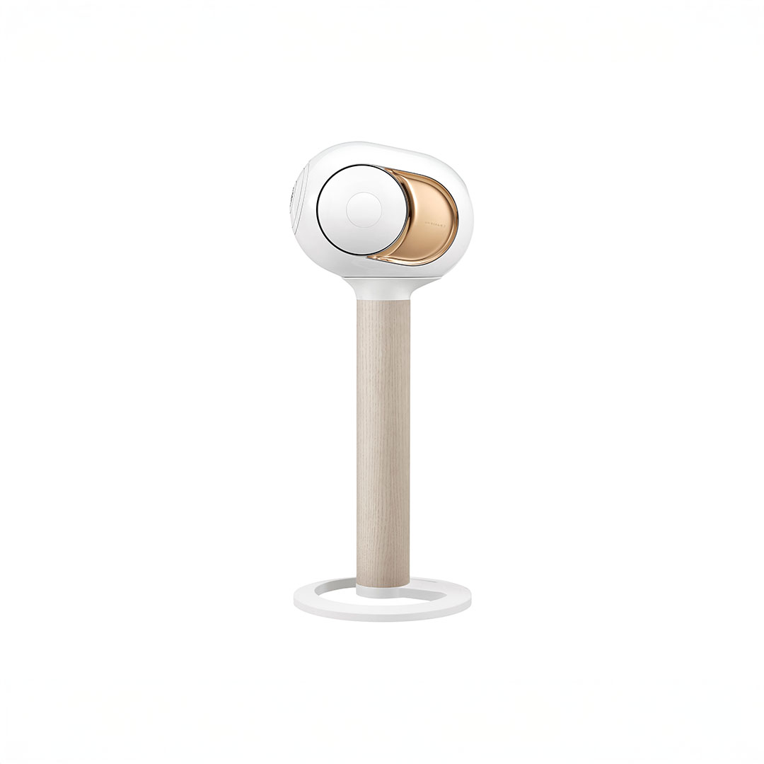 Modern speaker on wooden stand, white background