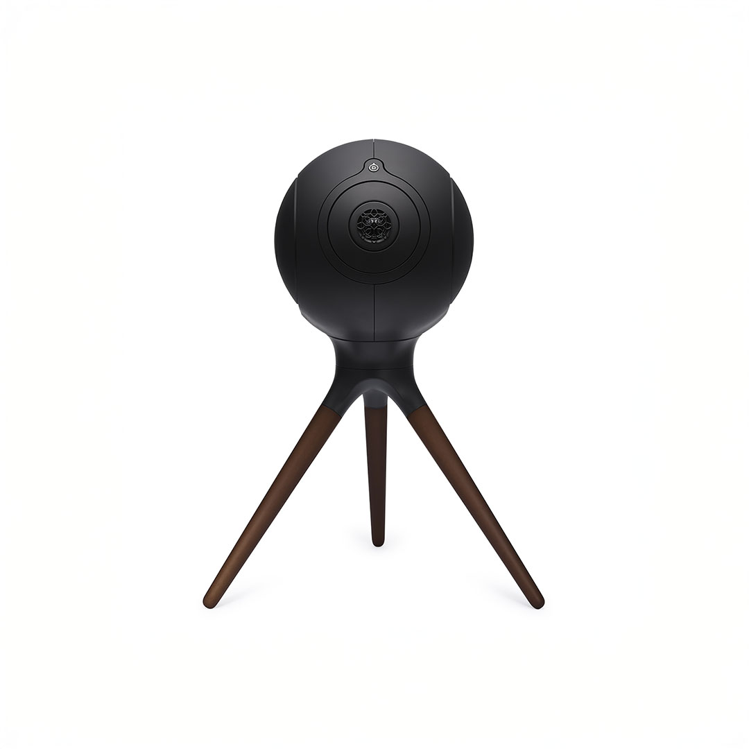 Black spherical speaker on tripod stand