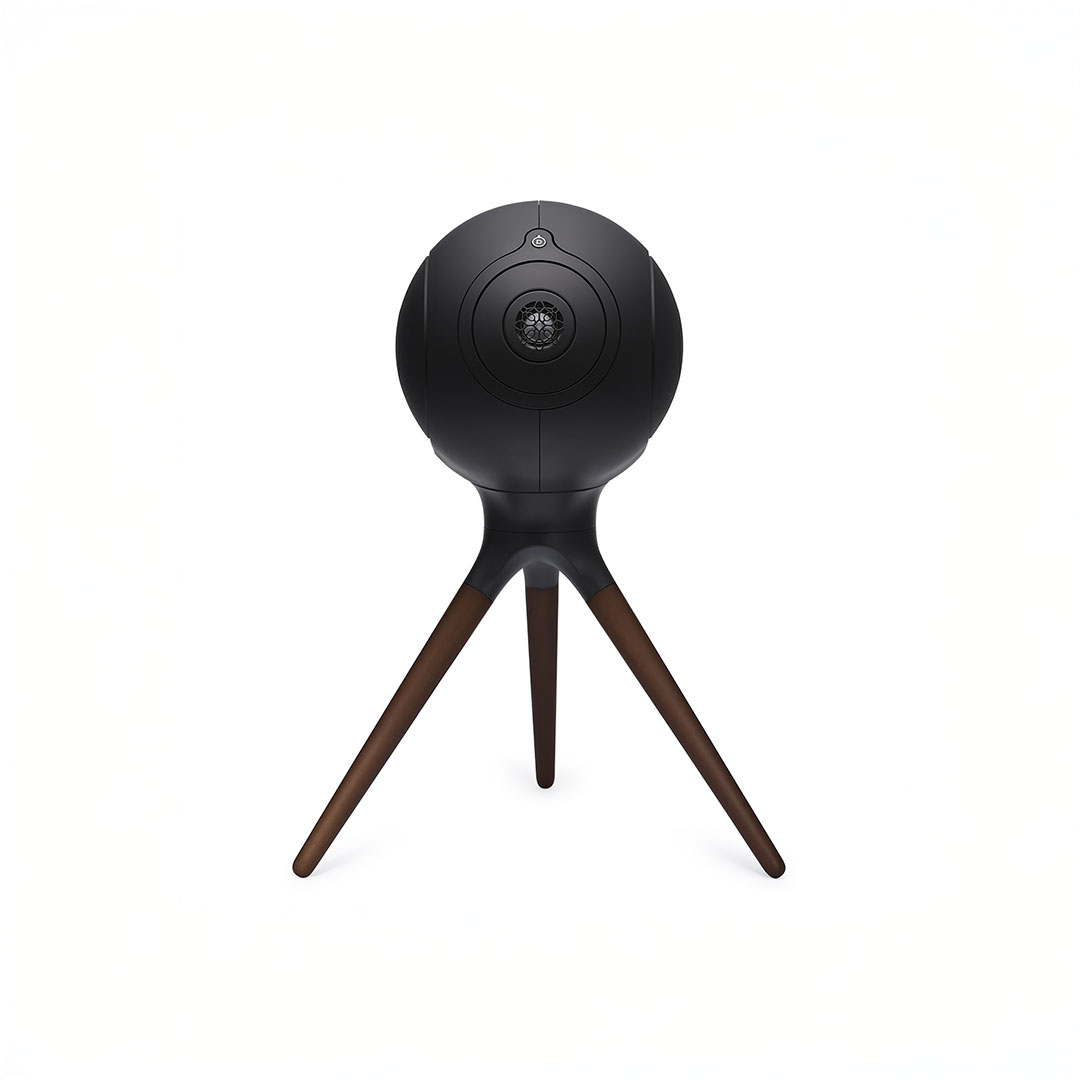Spherical speaker on tripod with wood legs.