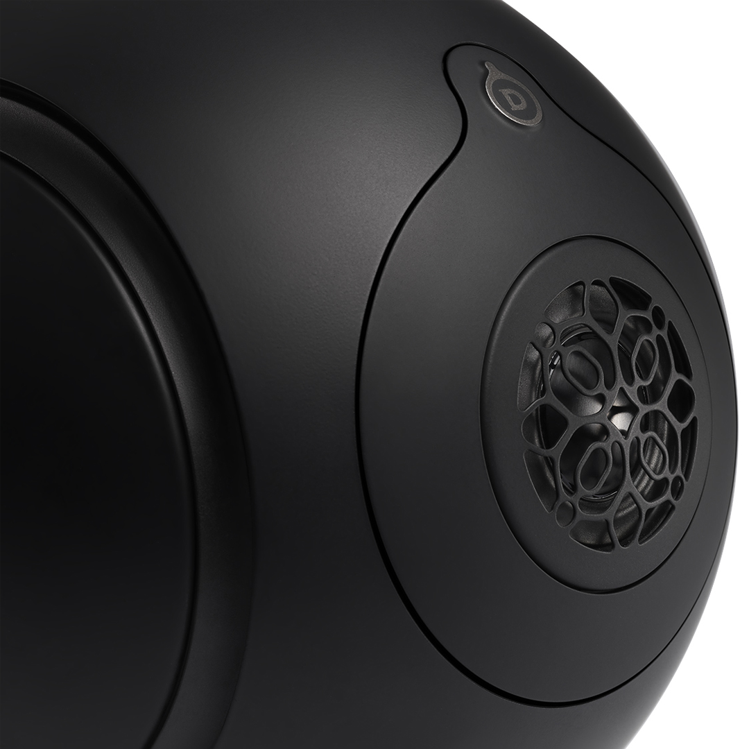 Close-up of black spherical speaker design.