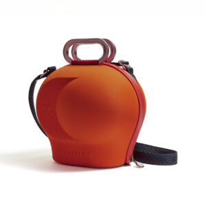 Red spherical backpack with handle and strap