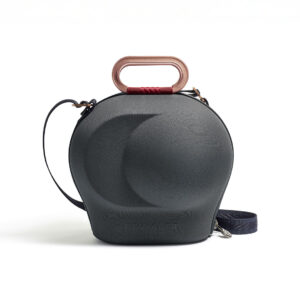 Stylish black and copper speaker bag with strap.