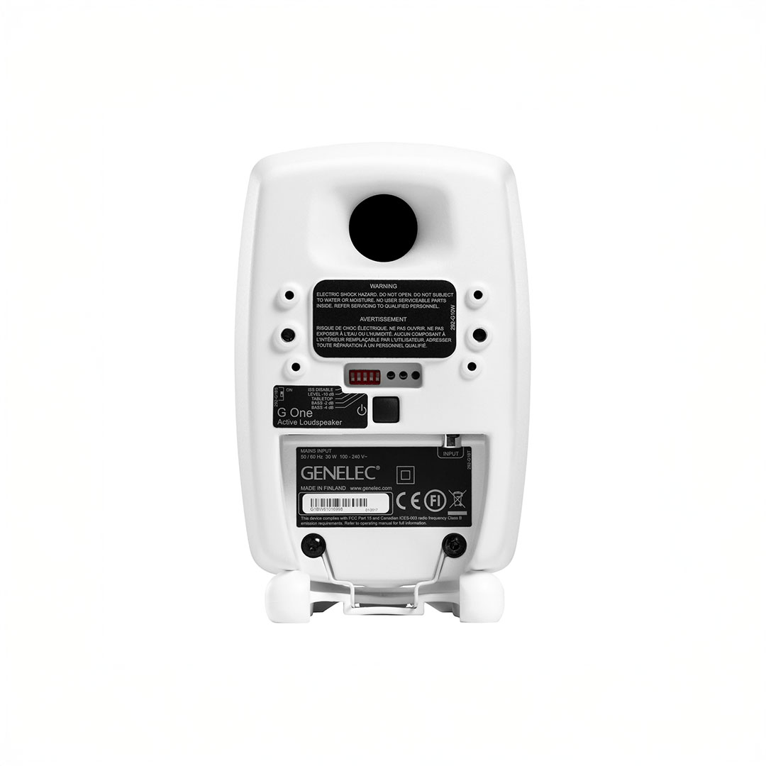 Back view of white Genelec active loudspeaker.