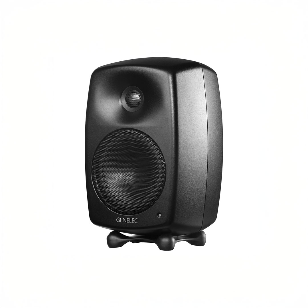 Black audio studio monitor speaker on white background.