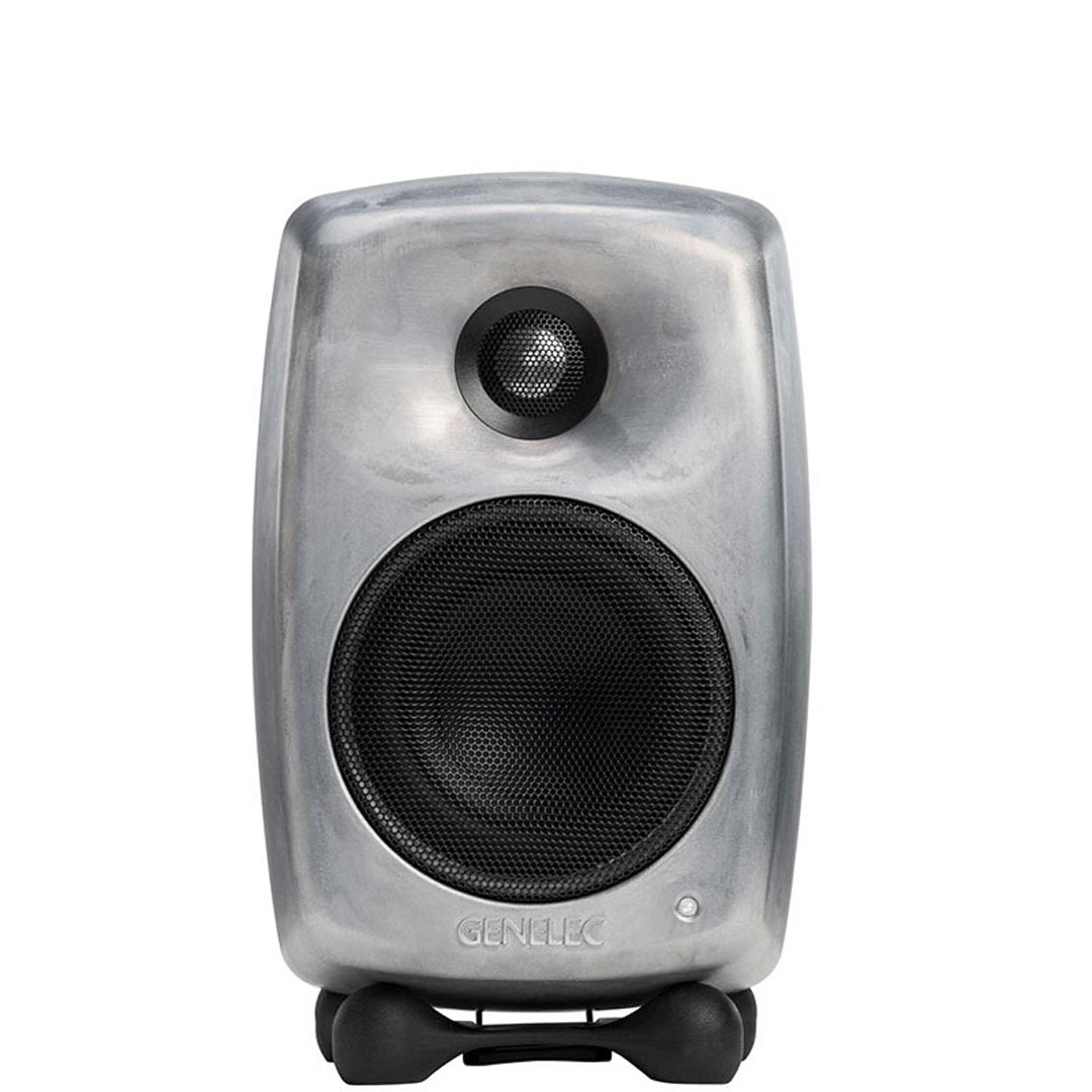 Metallic speaker with round grill and tweeter.
