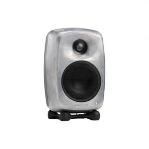 Compact gray speaker with black grille