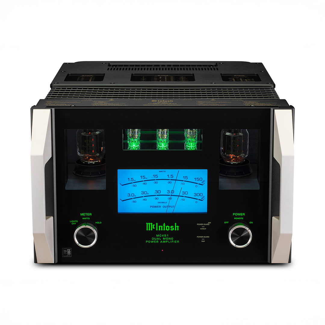 High-end stereo power amplifier with glowing meters.