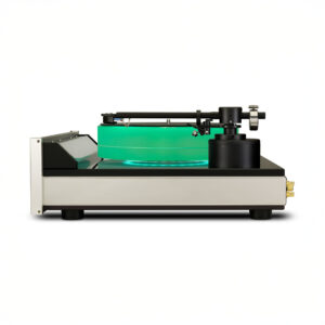 Modern turntable with green platter and tonearm.