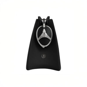 Over-ear headphones on black stand, minimalist design.