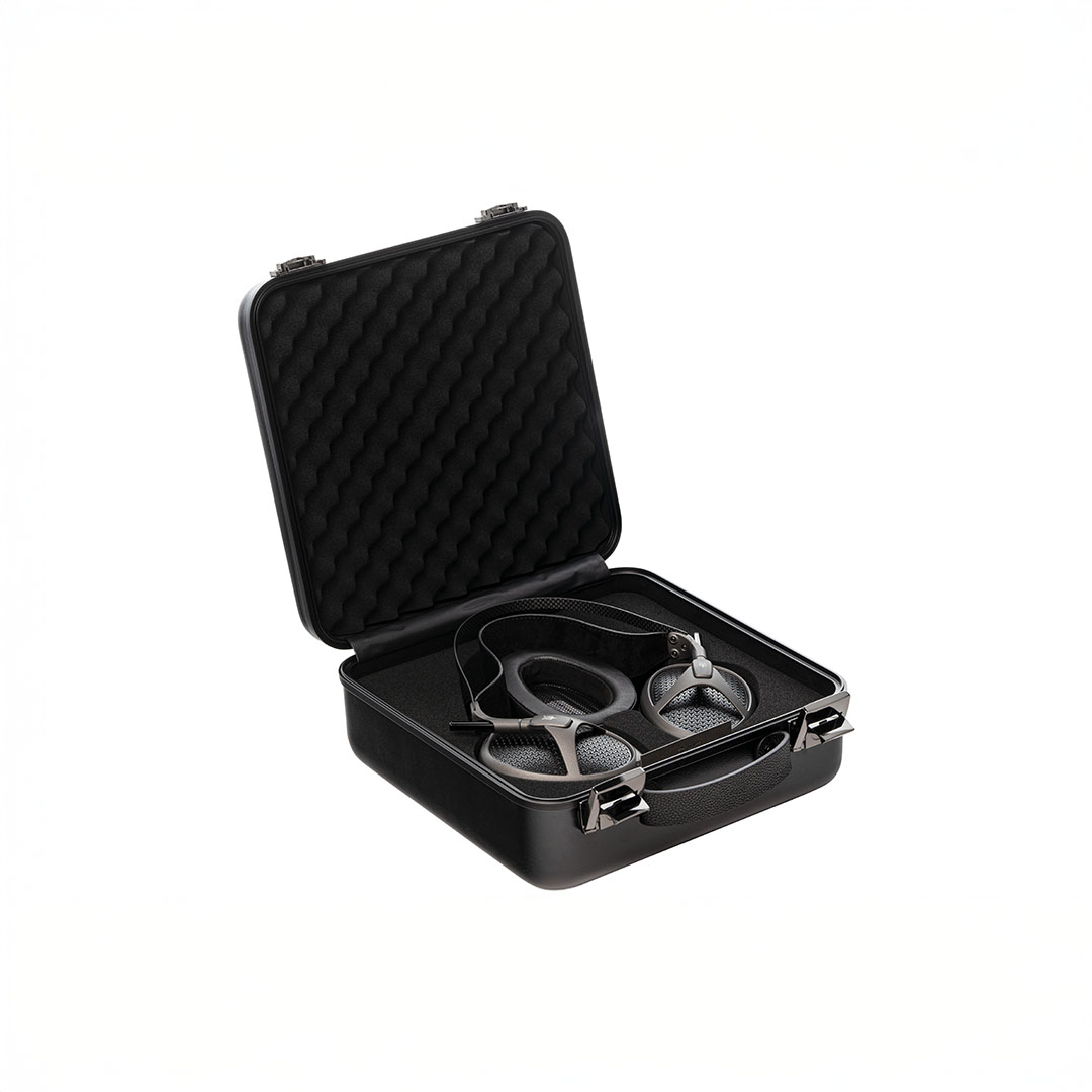 Headphones in hard protective case for travel