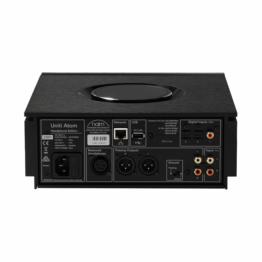 Back view of audio equipment with multiple connections.
