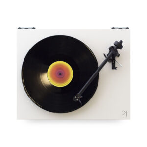 Top view of spinning vinyl record on turntable