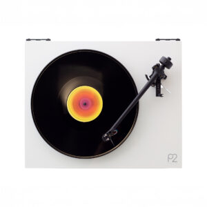 Turntable playing a vinyl record with colorful label.