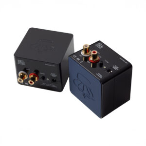 REL subwoofer wireless modules, black cubes with connectors.