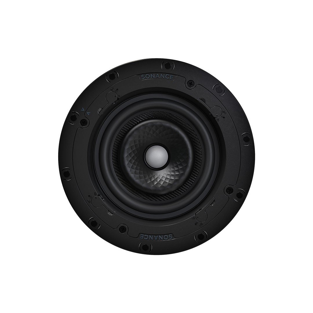 Round black ceiling speaker with intricate design.