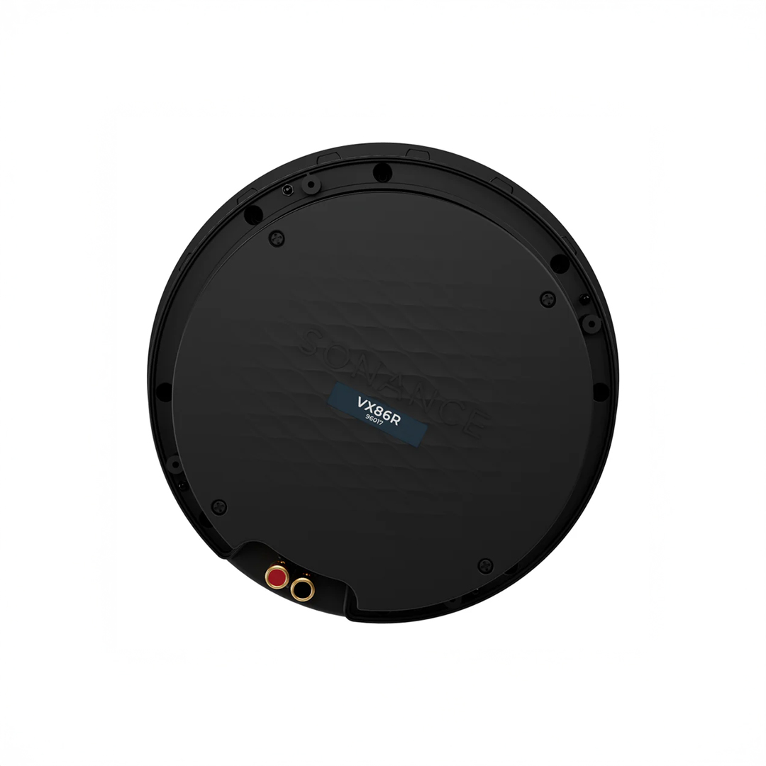 Black circular rear speaker view with connectors.